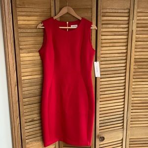 Brand new Calvin Klein dress size 12 red with zipper up the back short sleeves.